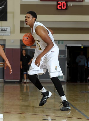 Columbia Christian senior Kameron Chatman
scored three of his game-high 28 in a big
53-51 win football win over De La Salle in
the MaxPreps Holiday Classic.