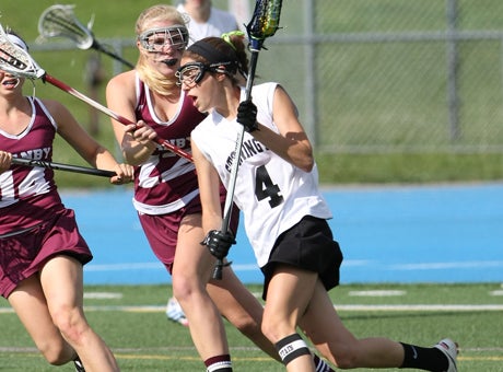 Emily Cassata (4)   helped carry Stonington to a 13-10 win against Granby in the CIAC Class S girls lacrosse final last Saturday. It was also a triumph for eastern Connecticut lacrosse in general.