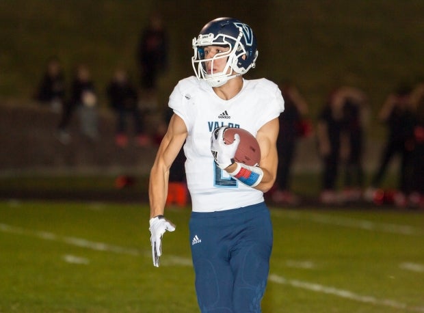 Luke McCaffrey looks for daylight during a September game against Pomona.