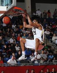Isaiah Austin of Grace Prep throws down at the Thanksgiving Hoopfest.