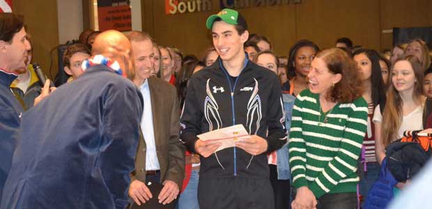 Emery Lehman stands with classmates at a sendoff ceremony before going to Sochi.