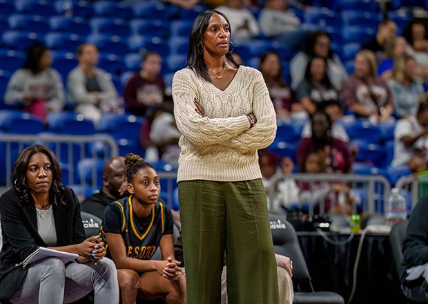 Oakl Cliff Faith Family Academy coach Andrea Robinson, seen here on the sideline for DeSoto last year, was suspended for two seasons Wednesday by the UIL for recruiting and other violations. The state association also ruled the program ineligible for postseason after it brought in 18 transfers, many of them high-profile college prospects. (Photo: Alex Garza)