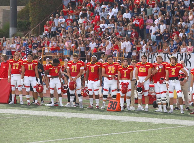 Cathedral Catholic during moment of silence before Honor Bowl game with Saguaro.