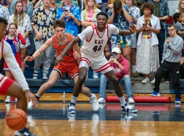 Five-star junior Flory Bidunga fights for post position in a win over Harrison. (Photo: Julie L. Brown)