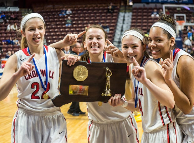 Cromwell (Conn.) is one of many girls basketball teams that hoisted title trophies this season.