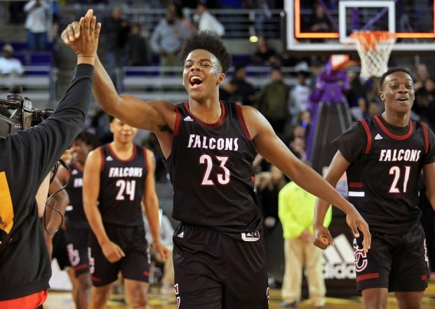 South Central junior Day'Ron Sharpe celebrates after a win over Millbrook in the semifinals.