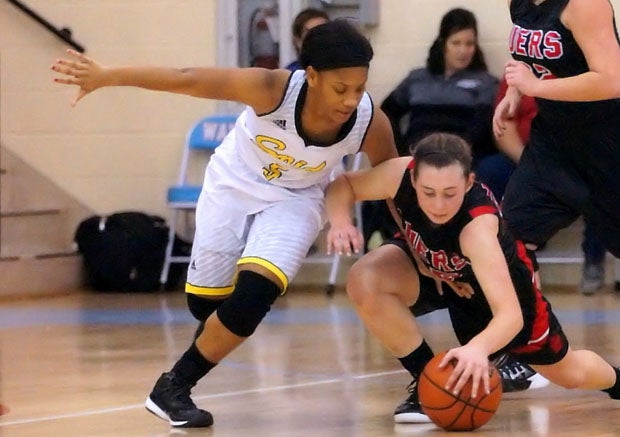 Sophomore Kayln Pickens (5) displays superb defense that has keyed Fort Wayne Snider's 12-4 start and why it is the MaxPreps Indiana Team of the Week.