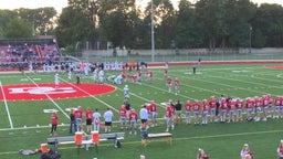 Divine Child football highlights East Lansing High School