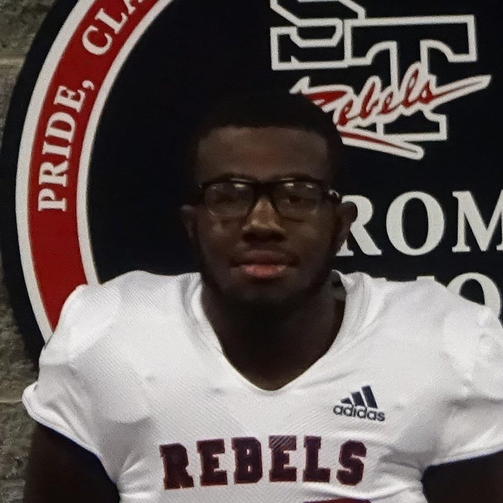 Quez Holmes