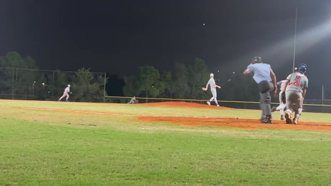 Baseball hit hard to the outfield.