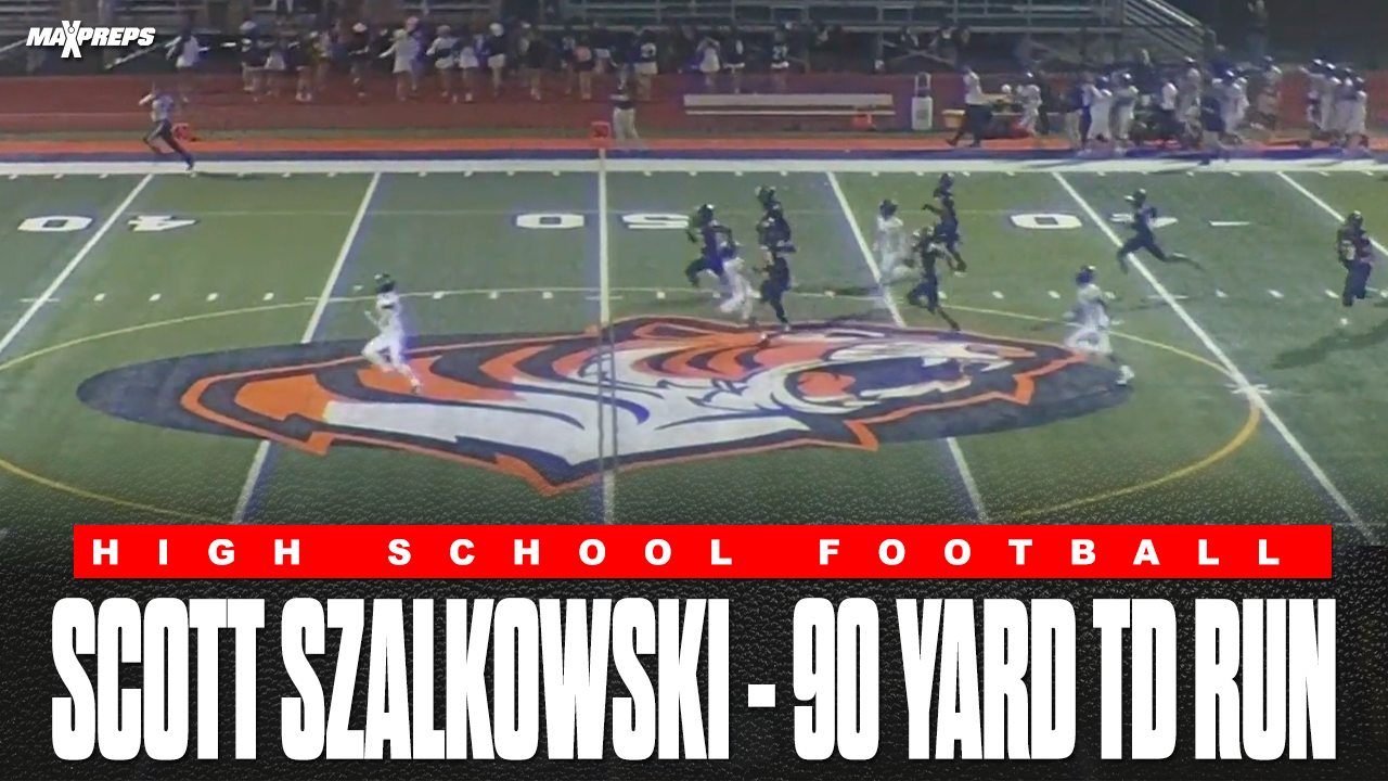 Dearborn's Quarterback Scott Szalkowski takes it 90 yards!
