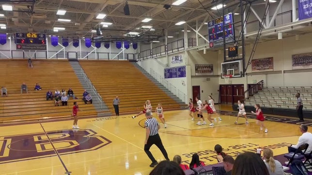 Annika Smith (Bloomington South Panthers) runs a fast break for a quick score.