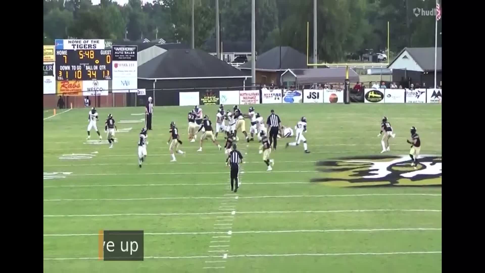 Right DE Landen combs #73 tackles running back after running over tackle