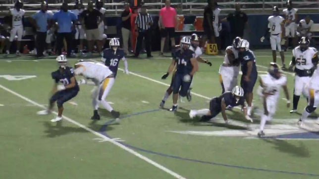 #16 stays in pursuit to make tackle on opposite side of field