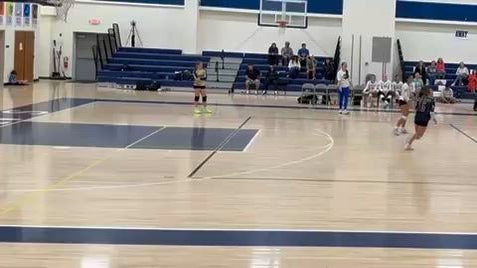 Dove and saved a shanked ball from teammate to keep game in play, won the point.