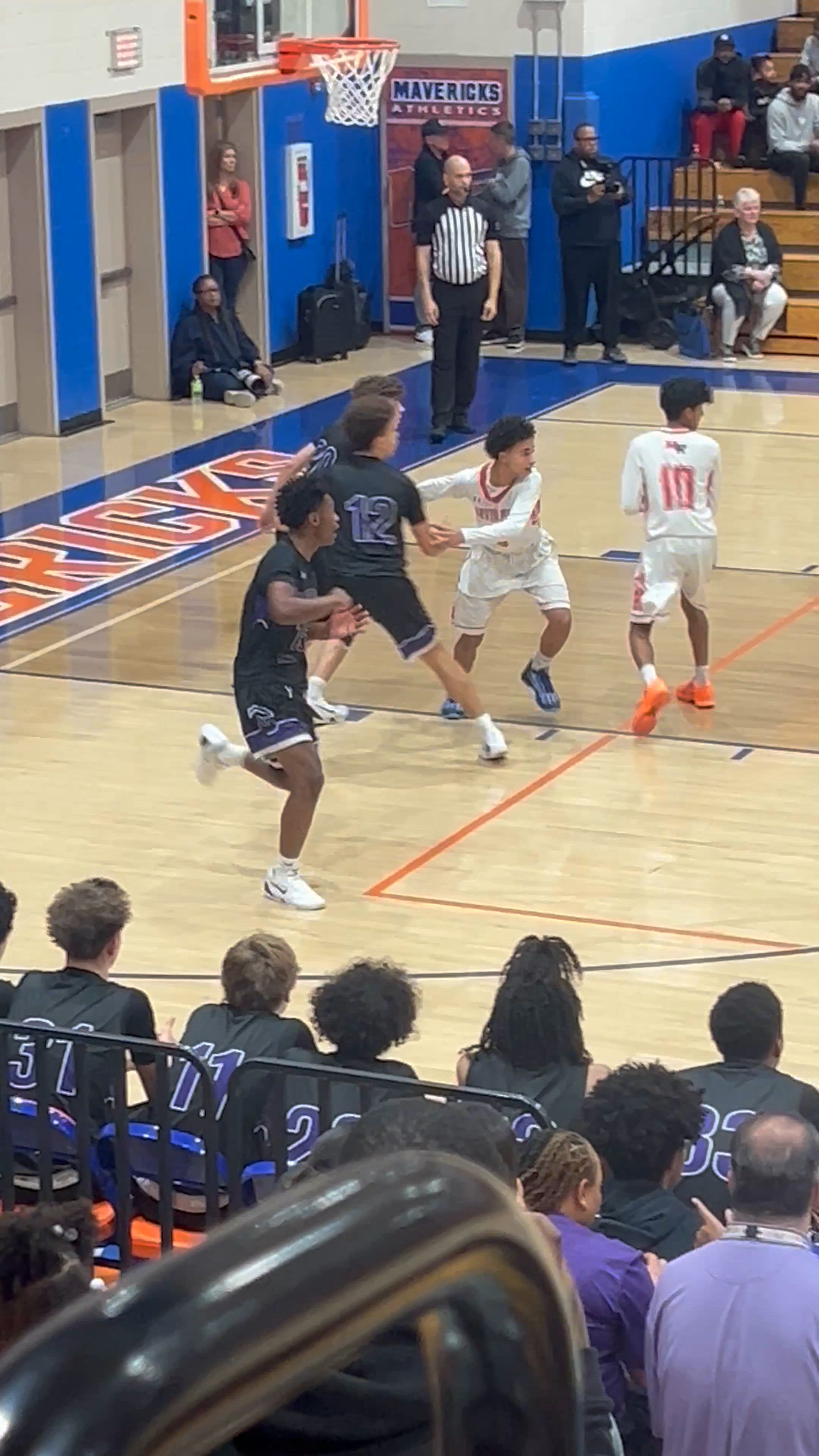 Mari Guzman with the And 1 against Marvin Ridge