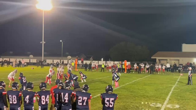 Joshua Lewis takes the handoff from Hunter Halbrook for a powerful gain on the ground.