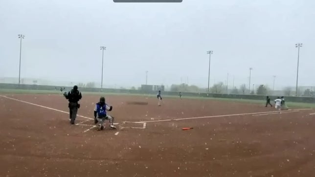 Always pay attention to a live ball in baseball! Junior catcher Riley Prevost takes advantage of the snow in a Varsity game between Jefferson Academy & Lyons. Prevost (JA) steals two bases and makes it to 3rd with a scorpion slide.