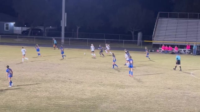 Sophomore Ally Chambers burns past a Largo defender to deliver a nice cross for Freshman Brienna Lane to score.