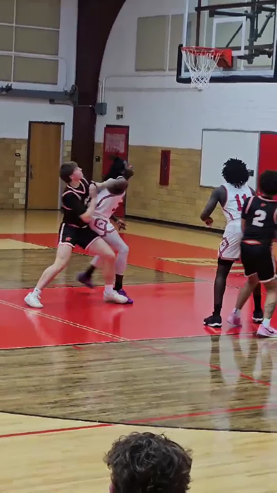 Bremen Jr G/F #11 with back-to back blocks.