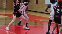 Bremen Jr G/F #11 with back-to back blocks.