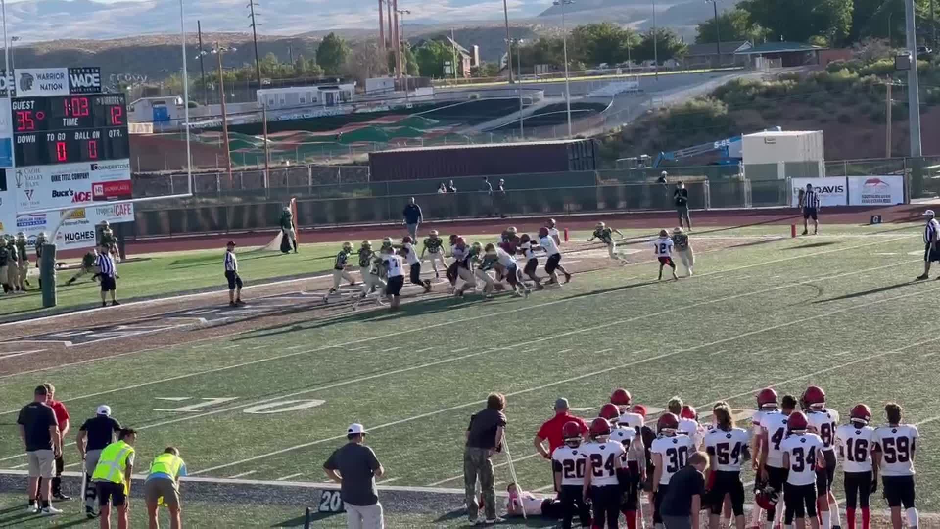Tigers QB #9 Tama-Satoa Numera runs the ball for a TD
