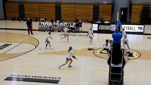 Addi Stuman scores with a block in the varsity volleyball match between Bradley and McMinn