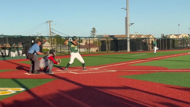 #22 Anakin Manuel (Capuchino HS - San Bruno Ca) smashes a ball over the LF Scoreboard.