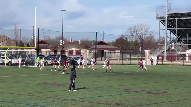 Shaylee Crain slotting home a rebound off a shot from Shiloh Willoughby in a scrimmage with Hamilton HS