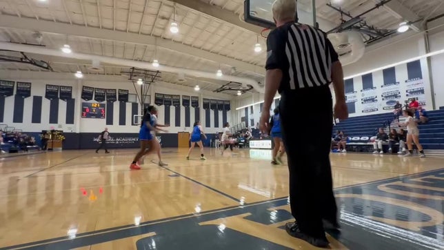 Nicaria McHellon with the rebound and put away.