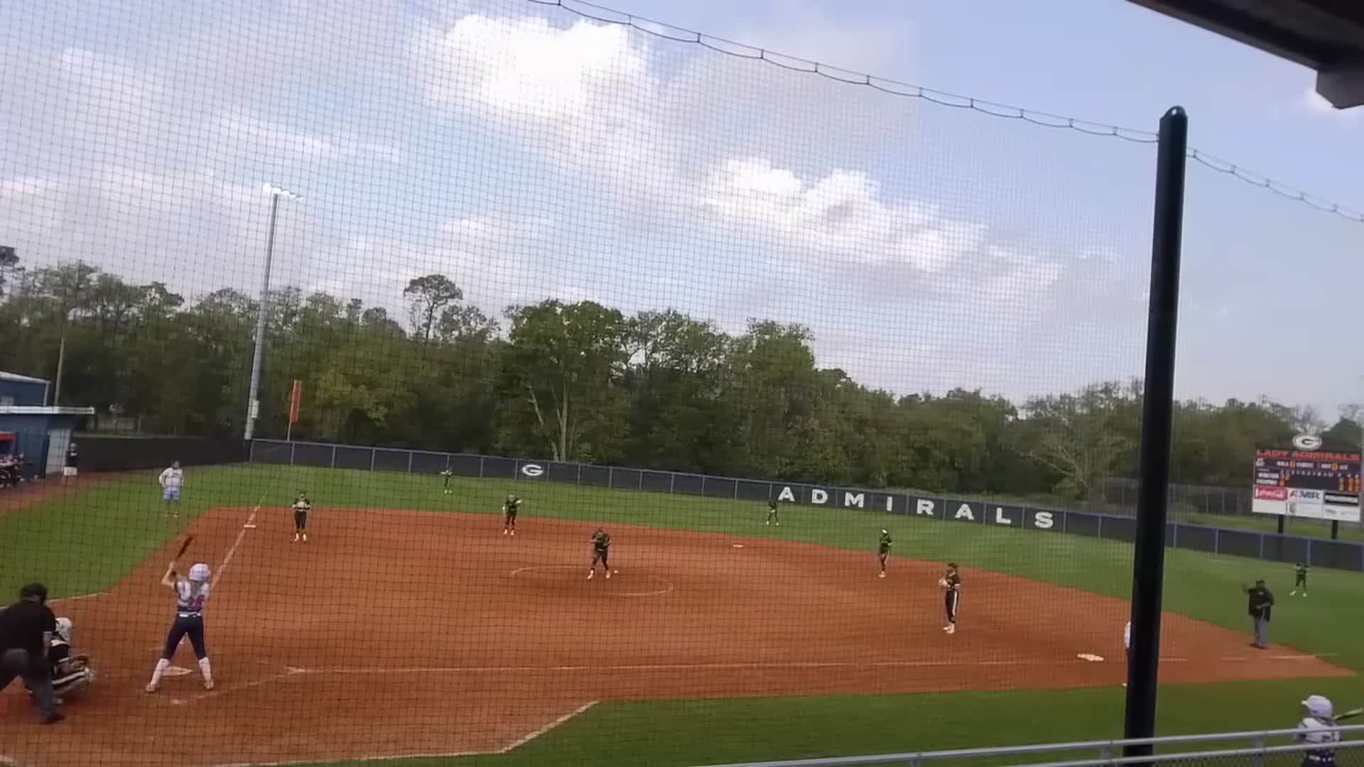 Jorja Wheeler batting vs Desoto Central hits a double