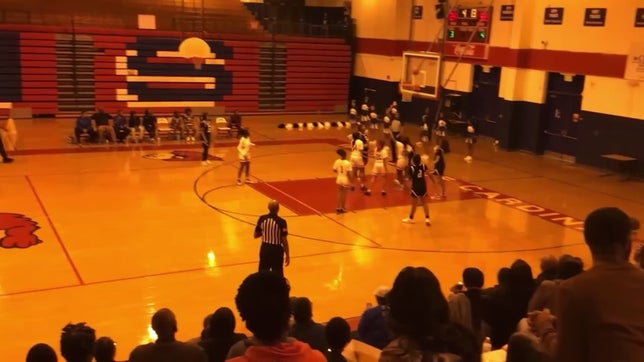 Tatianna Woods takes it into the paint for this amazing And-1 play.