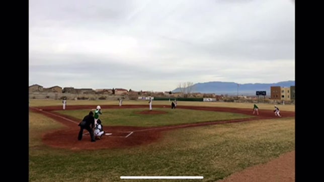 Ignacio Quintana junior throws out Abq high runner on steal attempt