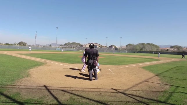 San Ysidro pitcher Marco Hernandez striking out Calexico's Erick Acevedo swinging