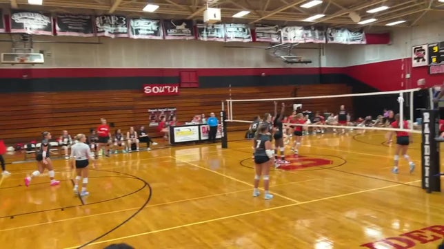 Mia serving and playing DS position.