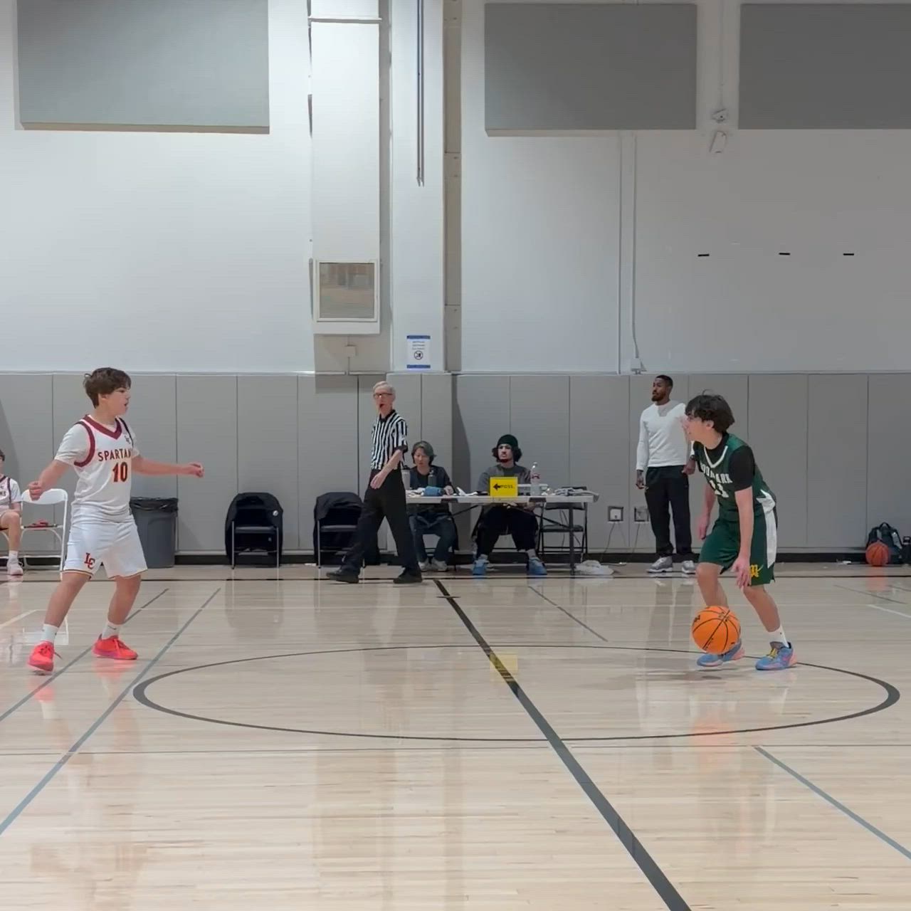 Sammy Sforzini (4) with the basket. Ashton Kritzer (11) with the assist.