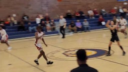 Grayson O'Shaughnessy with assist to star senior Shawn Washington.