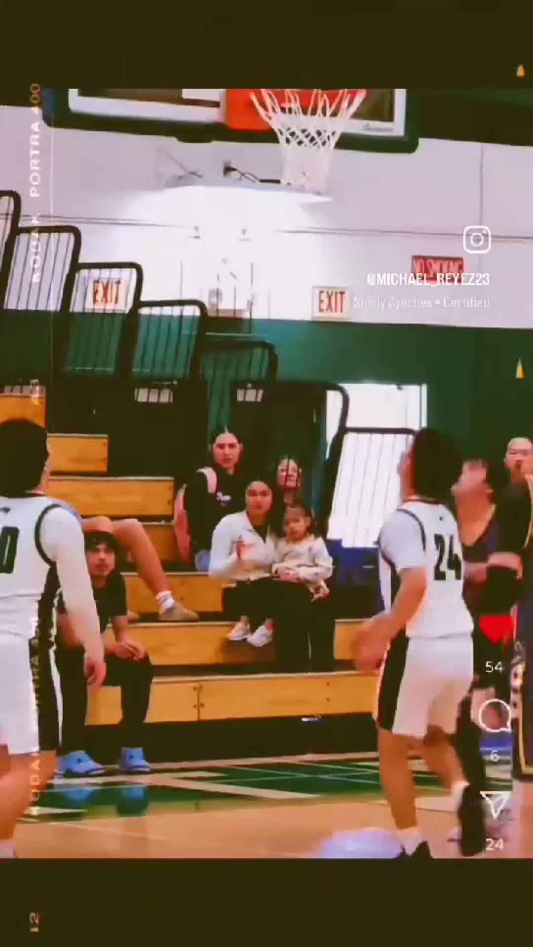#23 passed it to #11, passed it back and #23 grabbed it into a spin move, and finished at the rim.