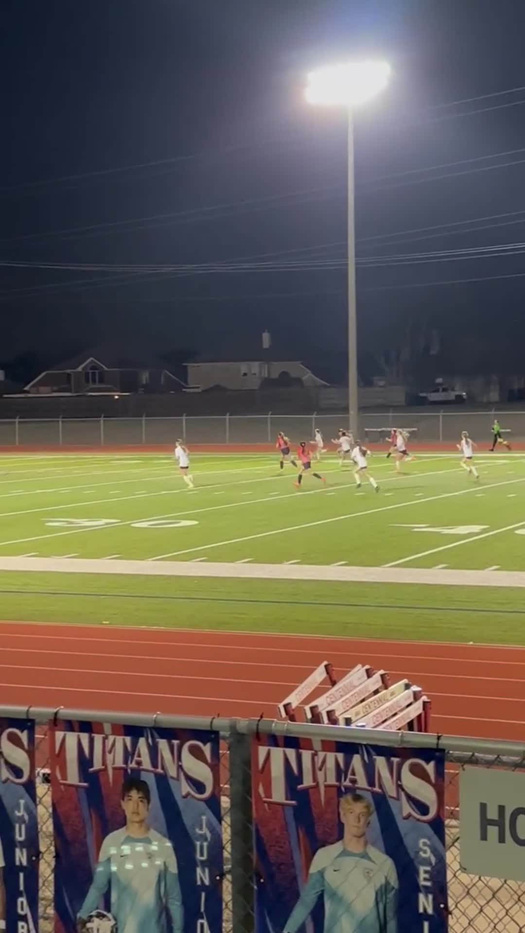JV ladies. Emerson (white jerseys) vs. Centennial (red)