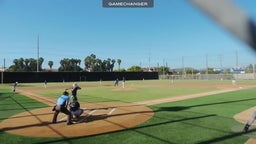 Ben Lopez of Carlsbad with a head first slide into home - play at the plate- safe vs San Marcos 5/9/25