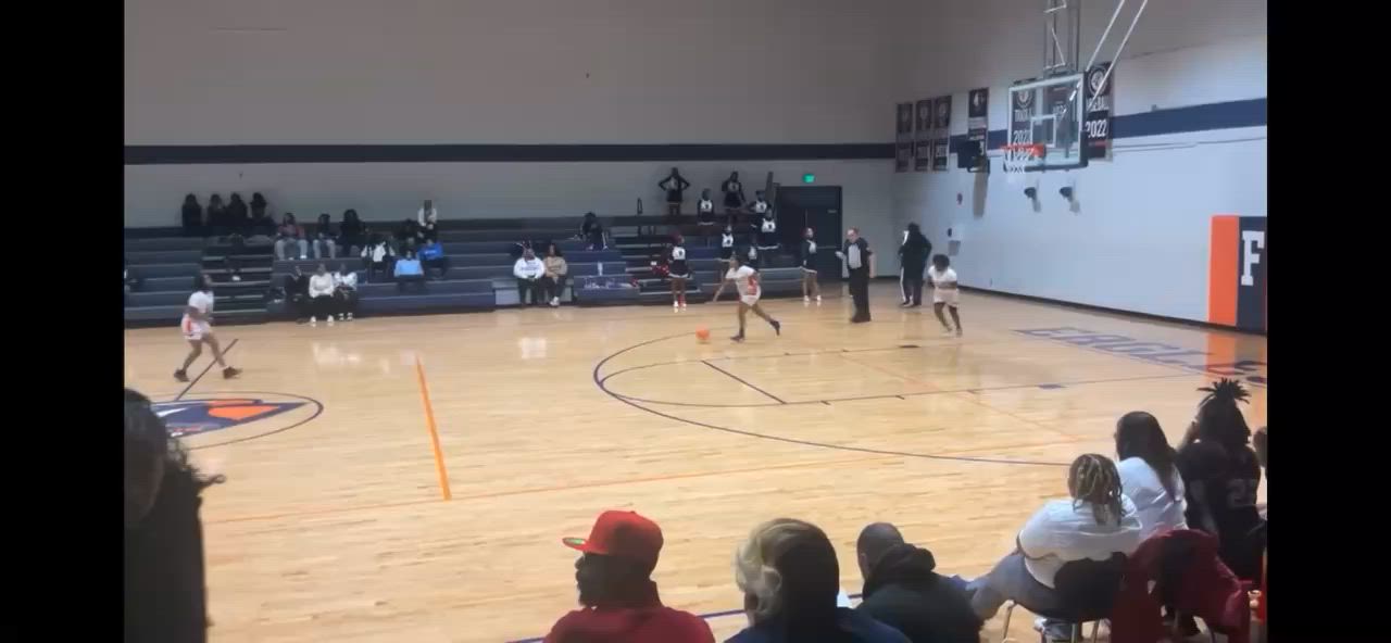 Alexia Smith steals the ball and scores the bucket