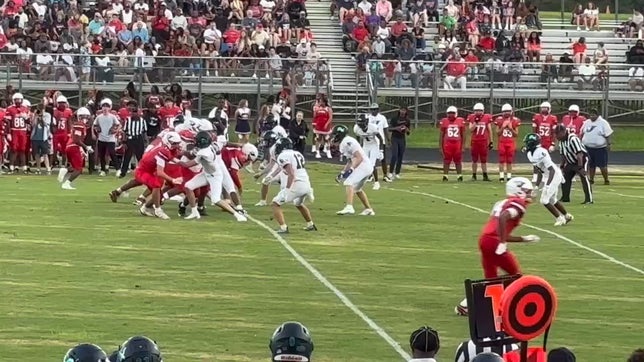 LRHS Middle LB #5 Derek Schemenauer assists in tackling Jordan's #5 RB, Damien Hayes, with LRHS LB #16, Nolan Hobbs.
