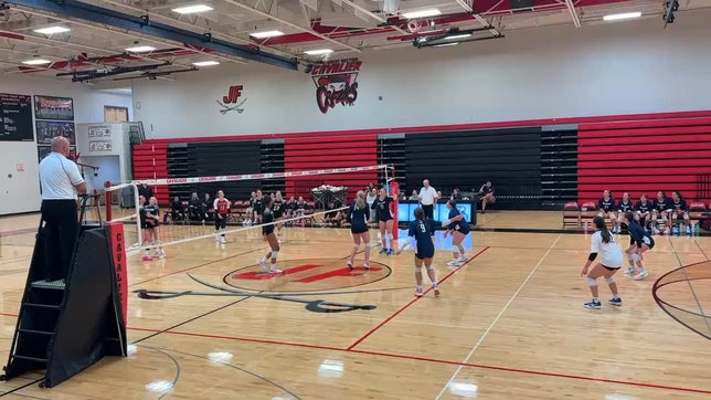 Left handed setter sneak attack produces a kill for set point.