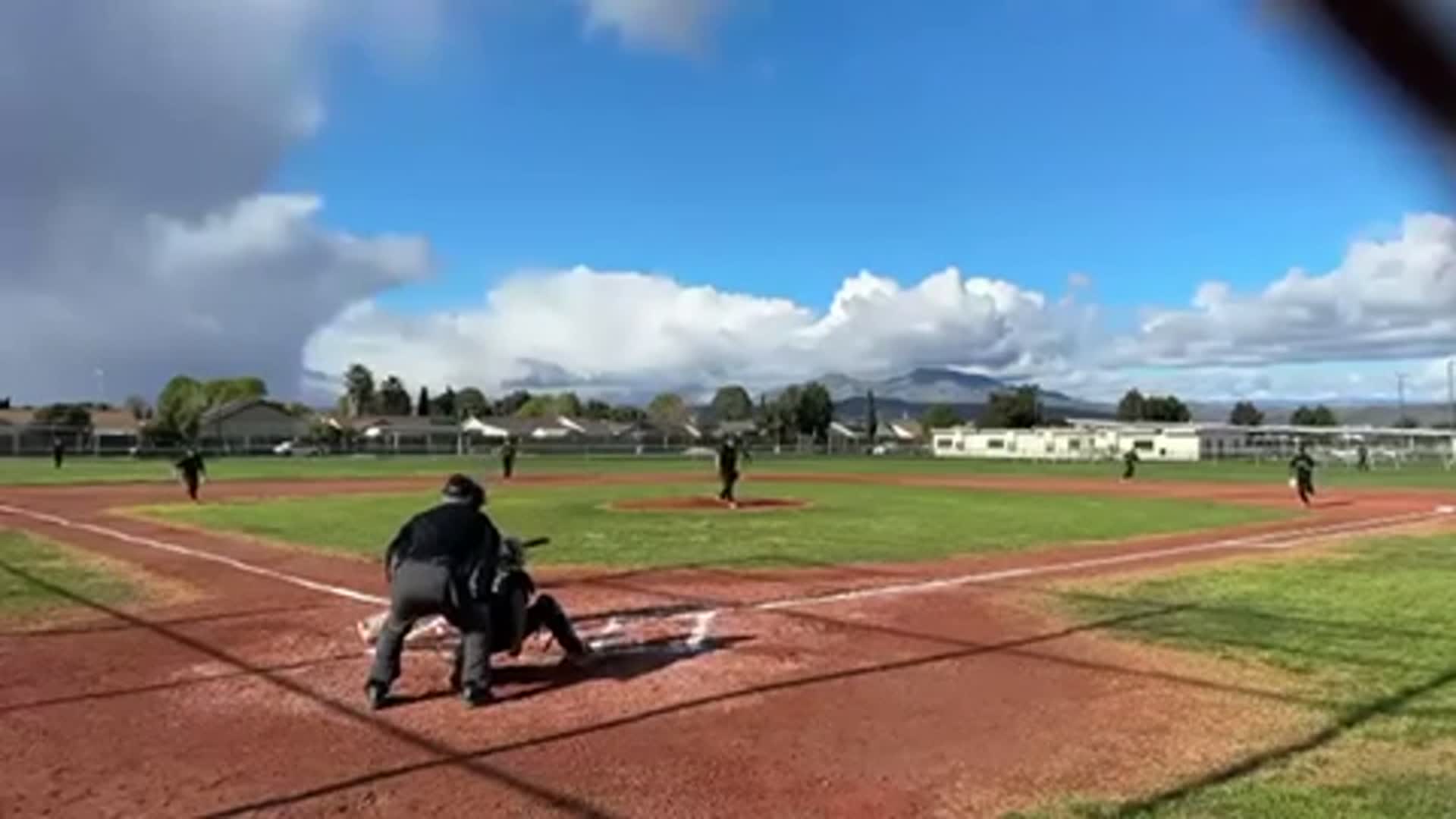 Elias Ramirez drops a bunt single