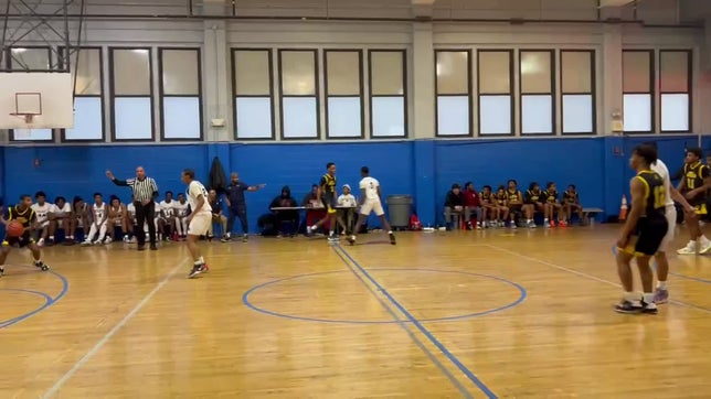 Crossover and Layup by Freshman Guard #1 Dahkenah Wilkins