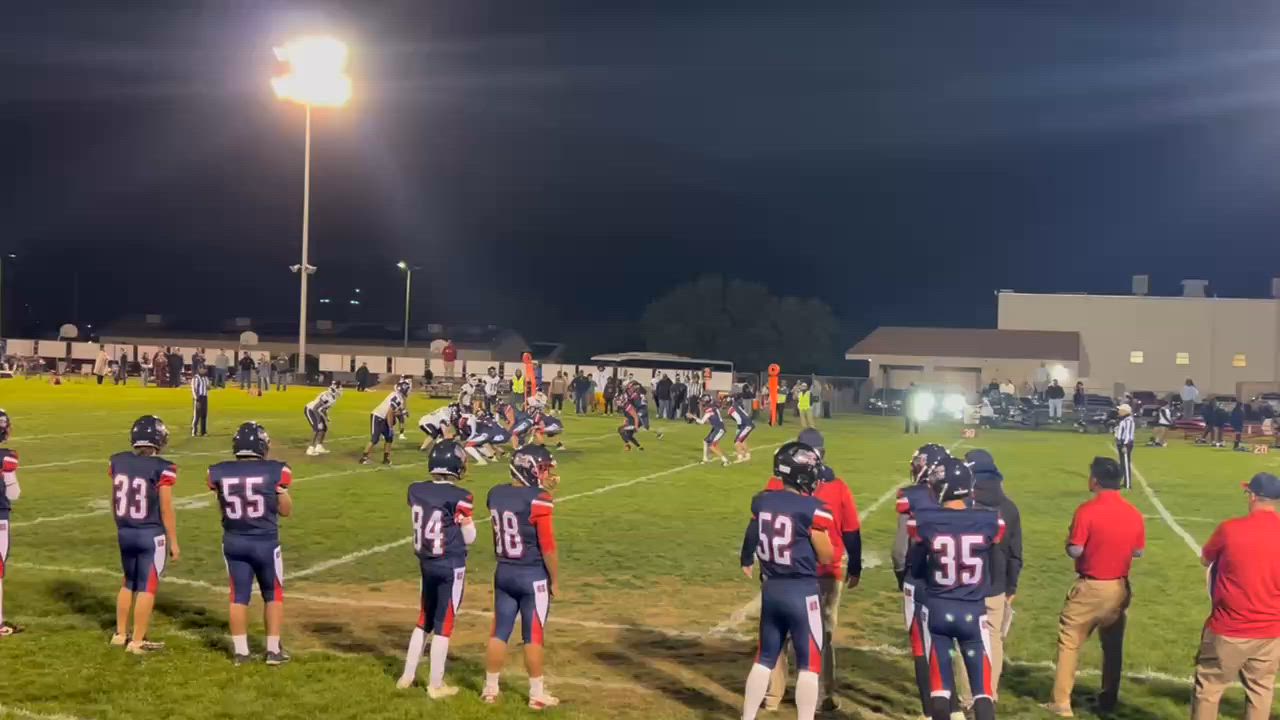 Hunter Halbrook scrambles for the gain