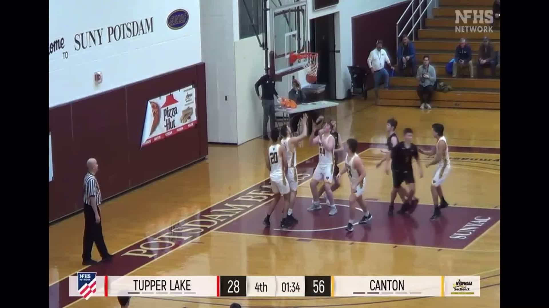 Thomas Peterson drives to score a layup for 2