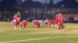Center Grant Opitz, 2024 Colfax High School, block on DT with QB off tackle keeper vs Davenport.