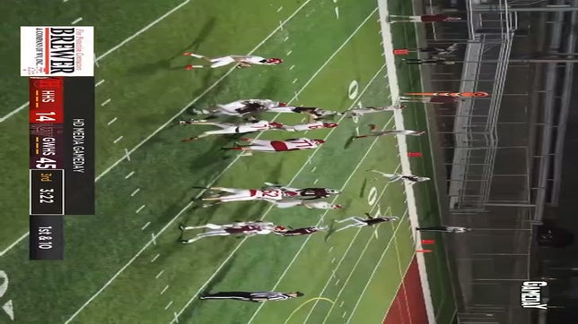 Avery Woodall picks of Hurricane QB late to stop scoring threat.