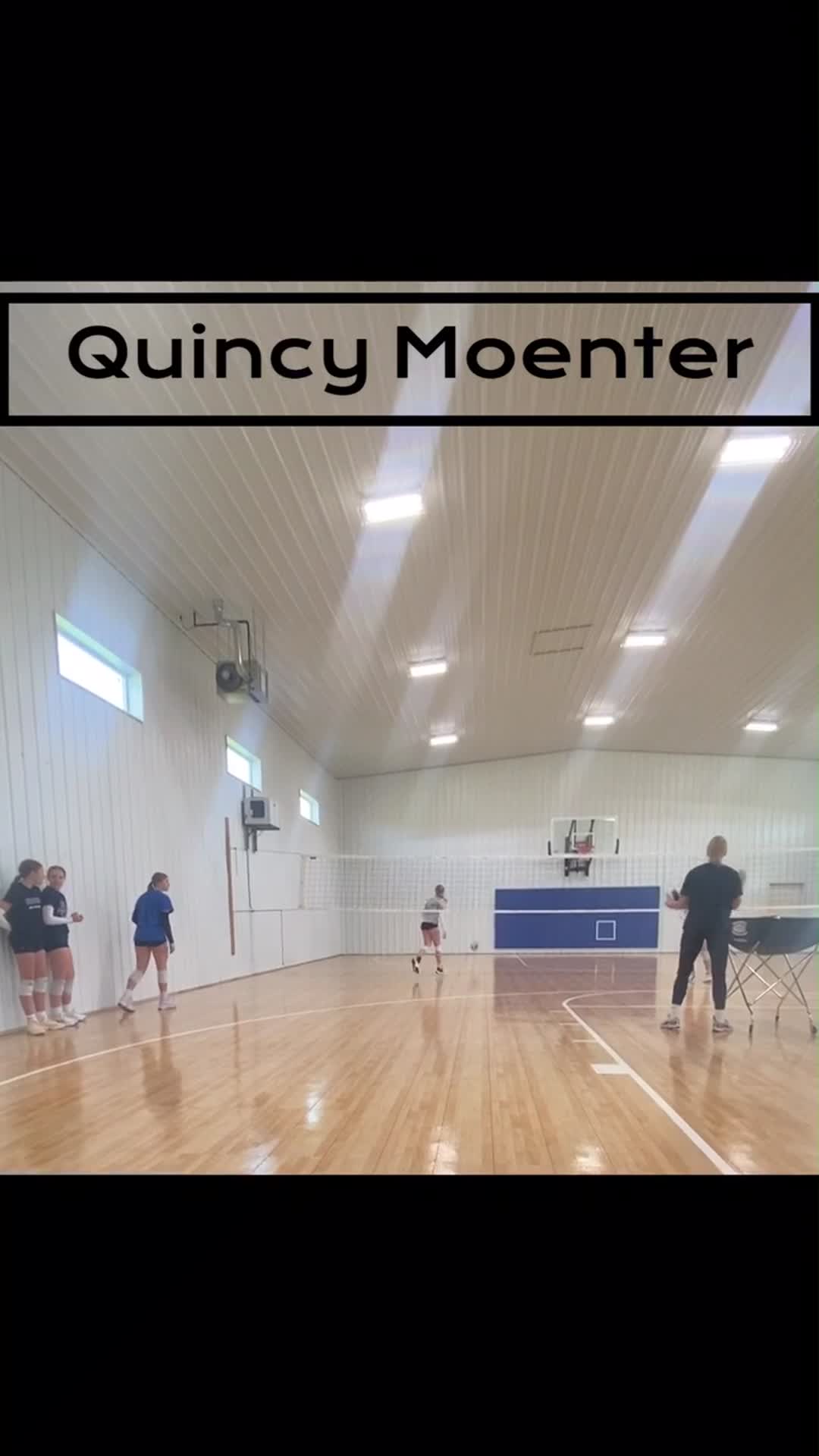 Working on setting four different teammates, Quincy Moenter, Emma Schnipke, Ava Reichley, and Alivia Palmer.